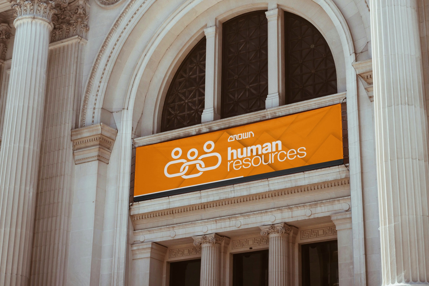 Crown HR environmental banner on building facade