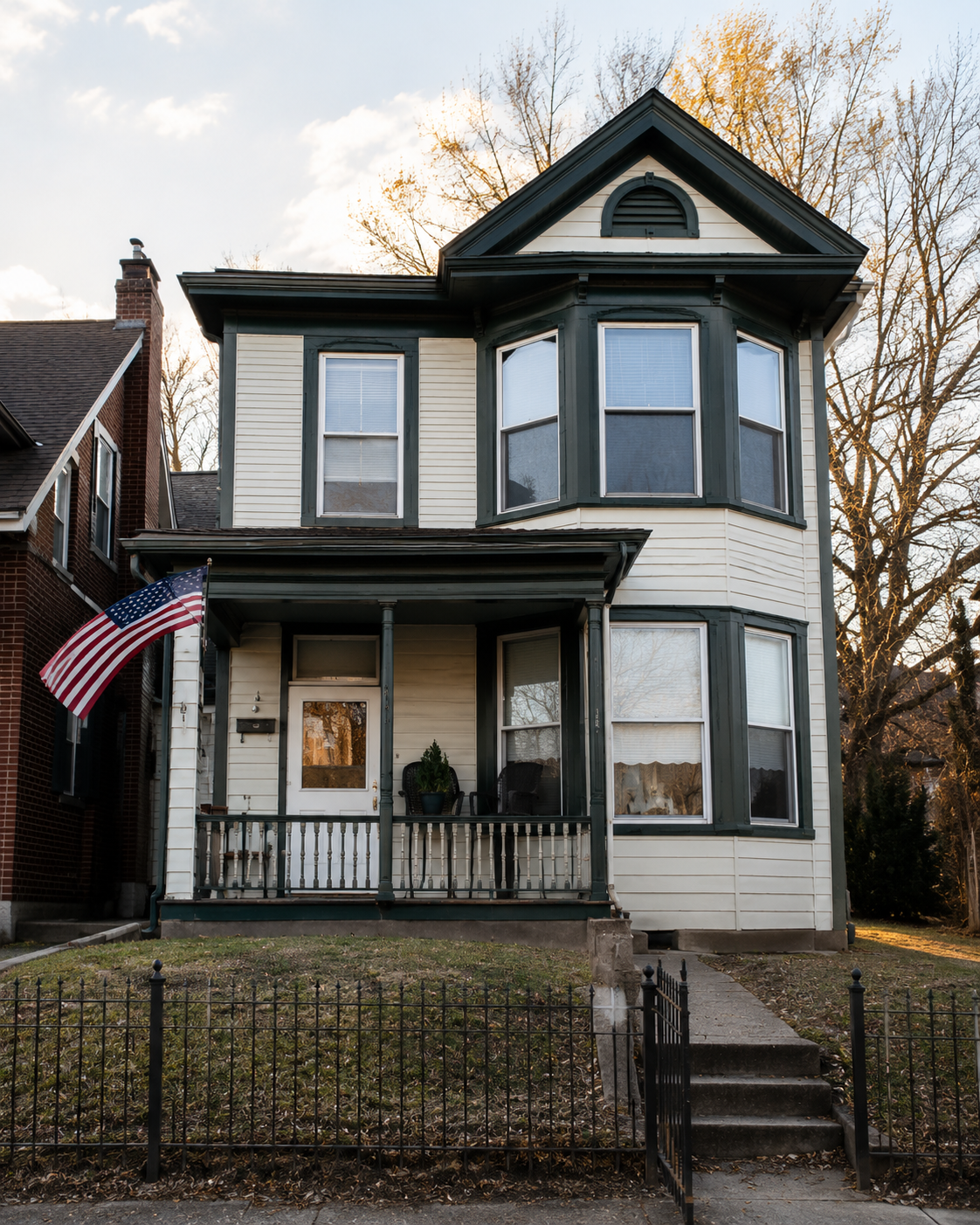 Restored home returned to its street