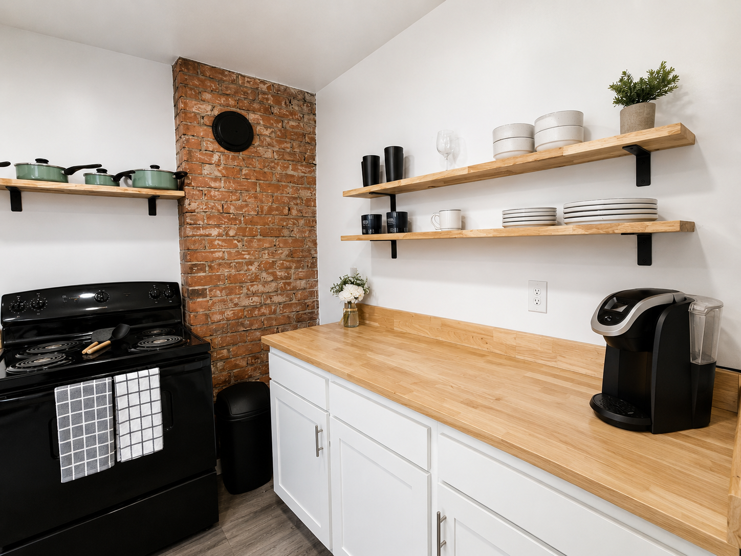 Restored kitchen — exposed brick and oak